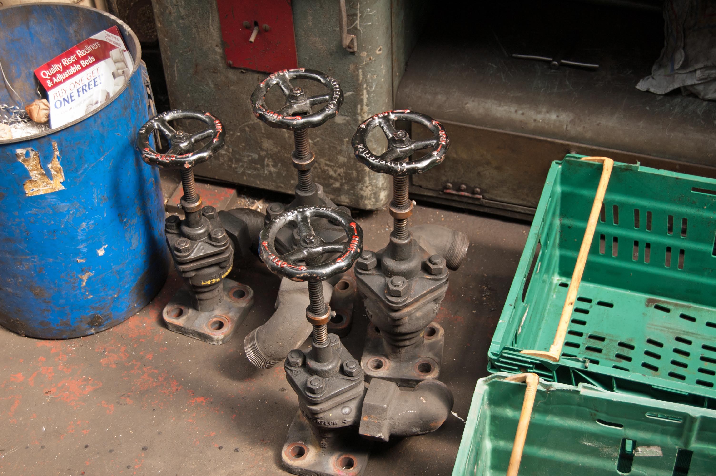 The four Klinger valves, from the steam manifold, before they are dismantled