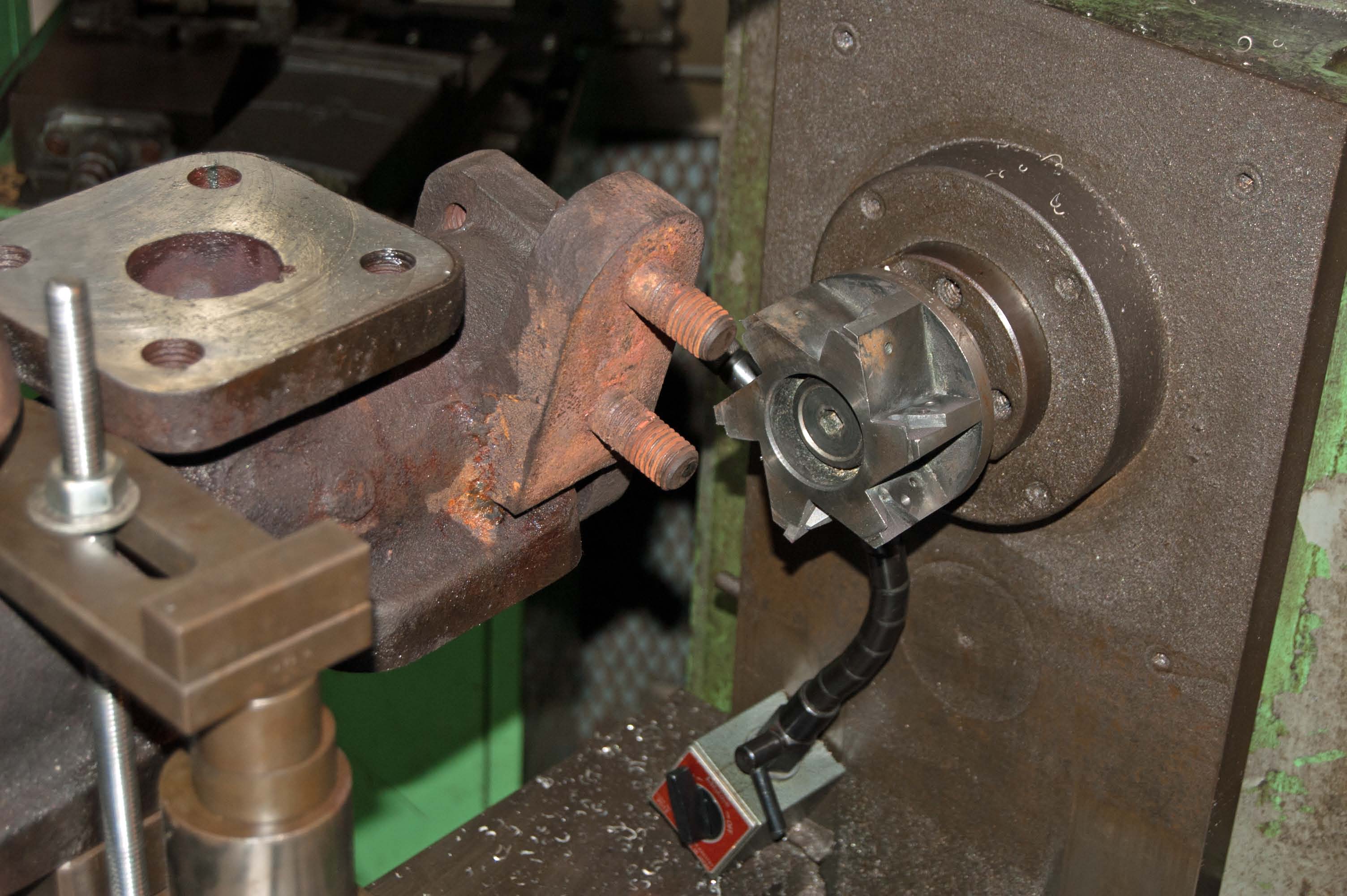 The cutting tool on the milling machine, ready to machine the face.