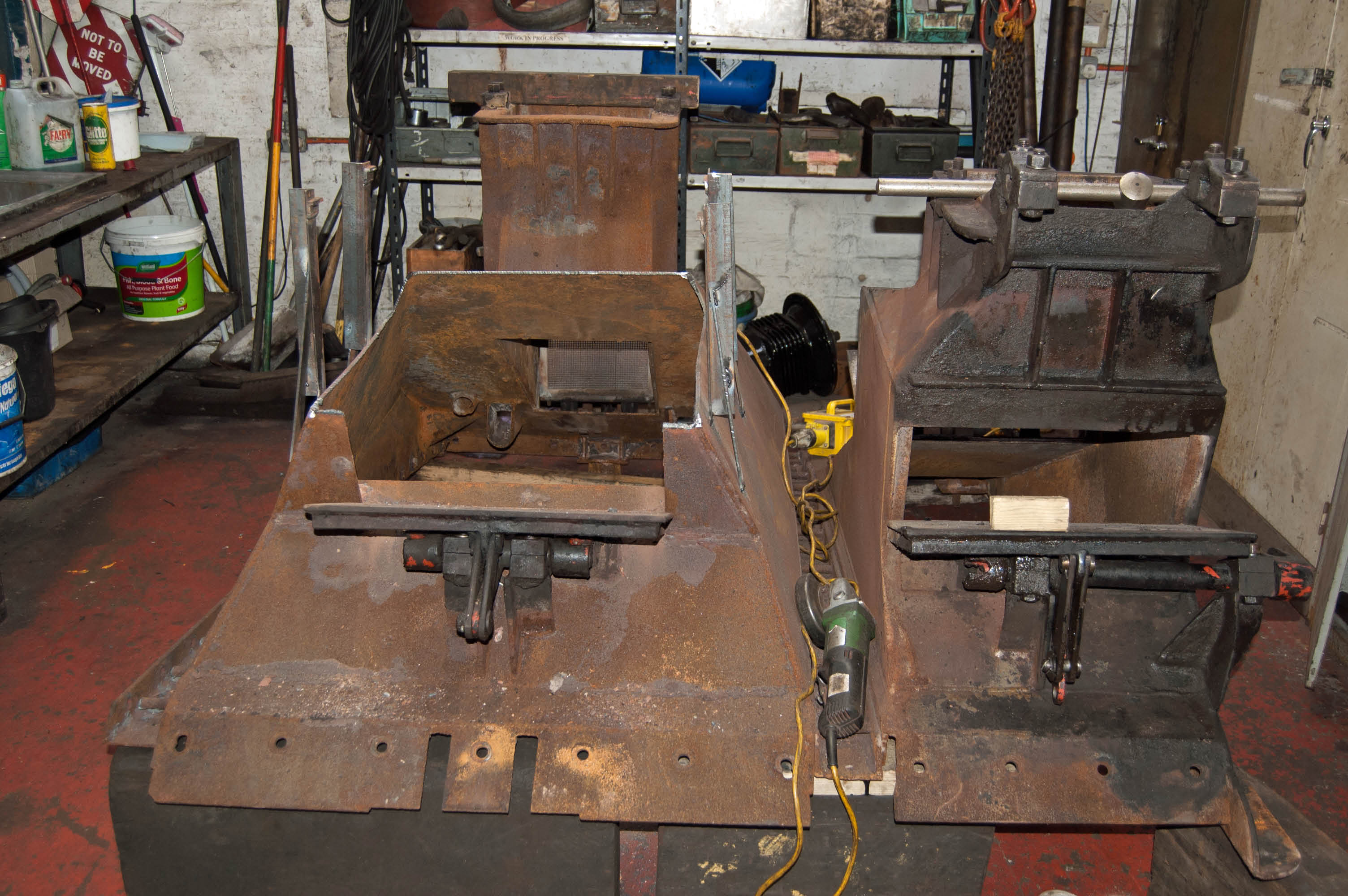 The ashpans have been removed, and partially dismantled, so that the damaged parts can be repaired or replaced.