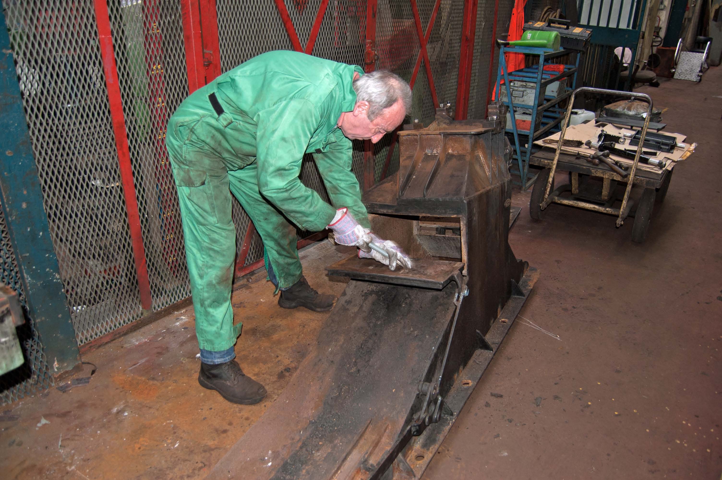 Other parts of the ashpans are being cleaned up, prior to repairs